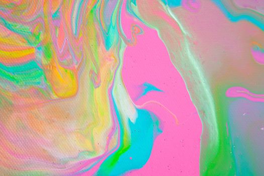 Painting in bright pastel colors using liquid fluid art trendy technique. Flat lay. Close-up. Concept contemporary art accessible to everyone. Horizontal.