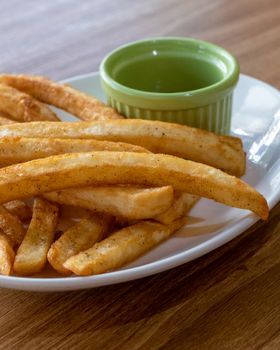 French fries and ketchup on plate