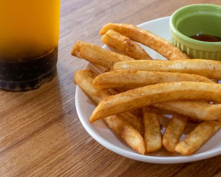 French fries and ketchup on plate