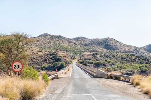The single lane road bridge over the Orange River below the Vanderkloof Dam
