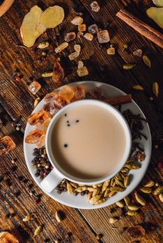 Cup of Infusion with Milk and Spices. Vertical Orientation