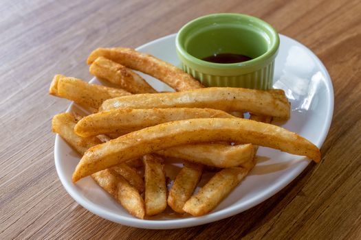 French fries and ketchup on plate