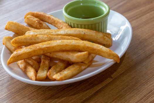 French fries and ketchup on plate