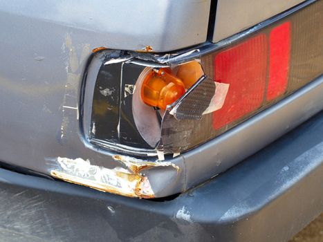 damaged car. traffic accident. the car's signal lamp is broken