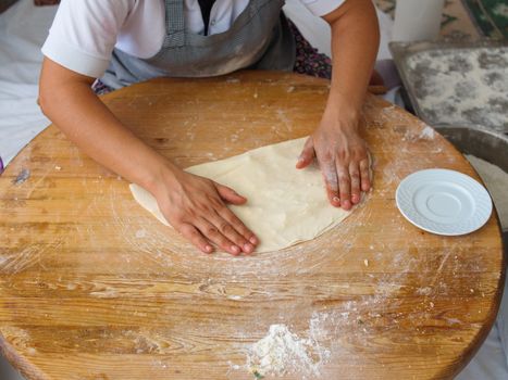 the woman who made "gozleme". "Gozleme" is a traditional Turkish snack and Breakfast meal.