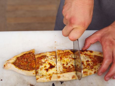 Pita(pide) with minced meat and cheese. pita(pide) from traditional Turkish cuisine