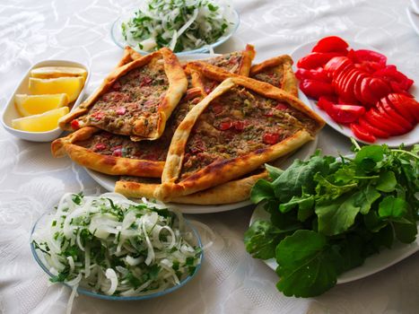 Pita(pide) with minced meat and cheese. pita(pide) from traditional Turkish cuisine