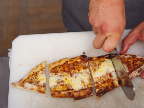 Pita(pide) with minced meat and cheese. pita(pide) from traditional Turkish cuisine