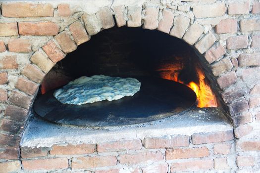 Yufka baked in the wood oven made of stone