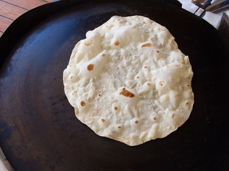 "Yufka" is a thin, round, and unleavened flat bread in Turkish cuisine.