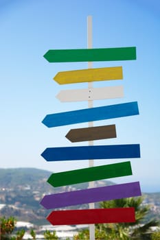 direction sign with blank spaces for text on beautiful sky background. Empty street sign