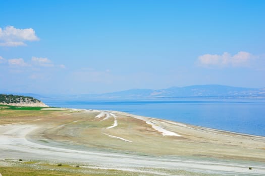 Lakeside. the lake shore and the natural pathway along the road