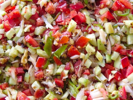 "gavurdagi" salad. Turkish Tomato Salad with Walnuts & Cumin .  served with spices, sour pomegranate and olive oil.