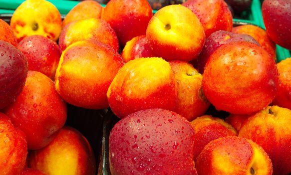 nectarine fruit. nectarine stack sold in the market. fruit background