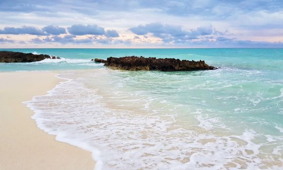 Beautiful wavy turquoise beachc in the Caribbean, at cayo Santa Maria.