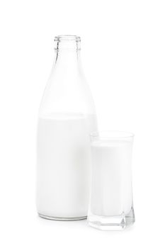 Bottle and a glass of milk, isolated on white background.