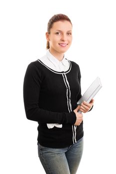 Portrait of a female student in uniform holding some books, isolated on white background.