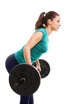 Lift! Young girl athlete lifting weights, isolated on white background. Ready for some deadlifts.