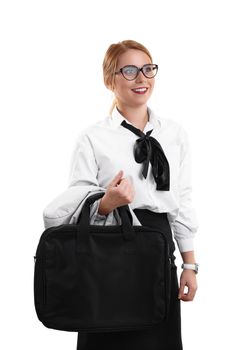 Smiling beautiful young business woman dressed in a suit with glasses holding a laptop bag, isolated on a white background