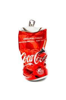 CHISINAU, MOLDOVA - August 20, 2019: Studio photo of empty and crashed Coca Cola aluminium can, isolated on white background