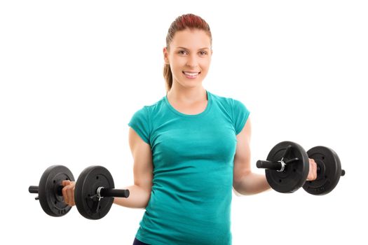 These will get me fit and ready the way I want. Beautiful young girl lifting dumbbells, isolated on white background.