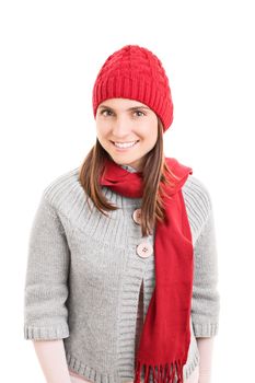 Portrait of a beautiful smiling young girl wearing warm red winter scarf and beanie, isolated on white background.