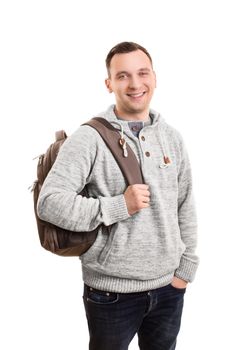 A portrait of a young male student with a backpack, isolated on white background.