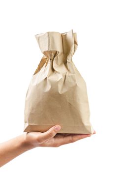 Woman hand holding giving paper bag isolated white background, Save clipping path.