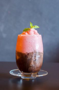 Chocolate and strawberry smoothie on table in resturant bar.