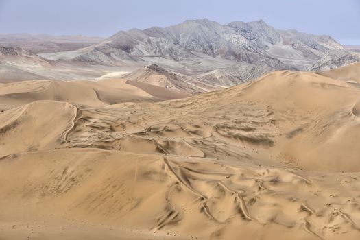 Colorful sand dunes with beautiful patterns and ripples in the Namib-Naukluft National Park, Namibia