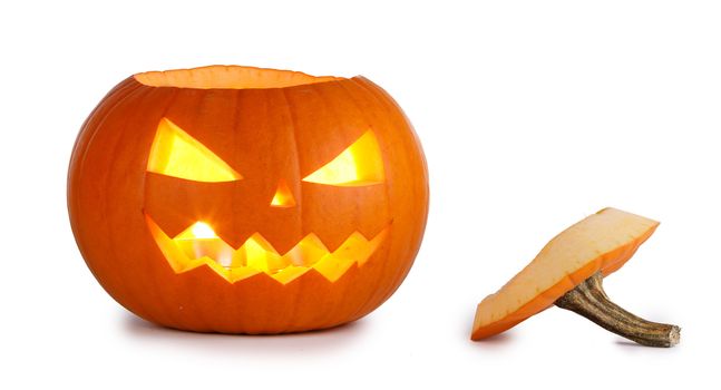 One glowing Halloween Pumpkin with peduncle away isolated on white background