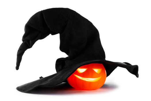 Jack O Lantern Halloween pumpkin with oversize witches hat isolated on white background