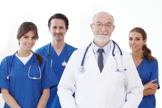 Team of professional doctors isolated on white background