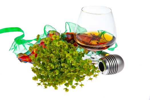 Glass with cognac on an isolated studio background