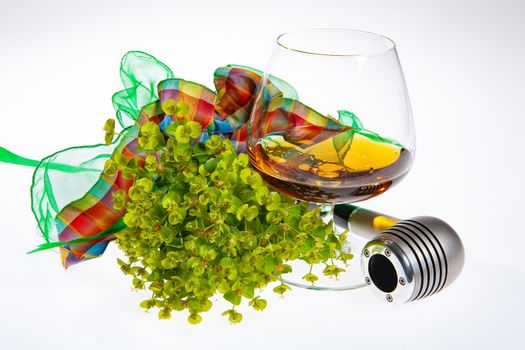 Glass with cognac on an isolated studio background