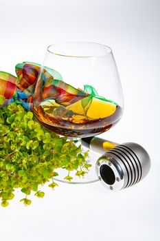 Glass with cognac on an isolated studio background