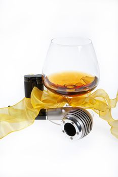 Glass with cognac on an isolated studio background