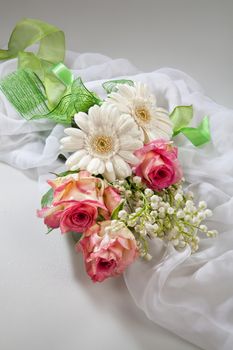 Still life with flowers on a studio background