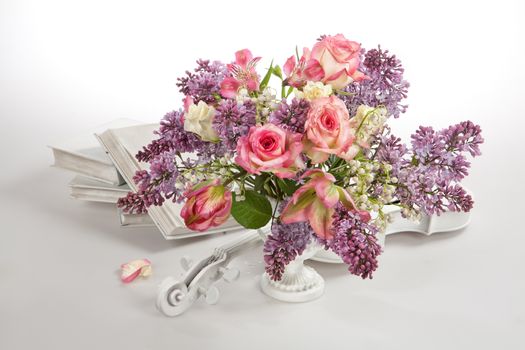 Still life with flowers on a studio background
