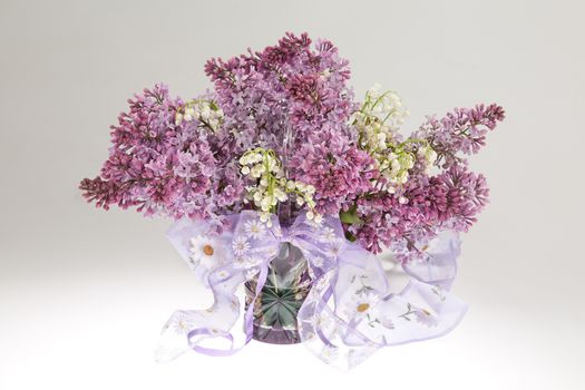 Still life with flowers on a studio background