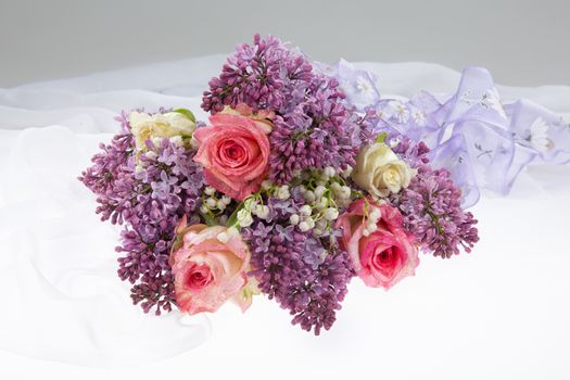 Bouquet with flowers on a studio background