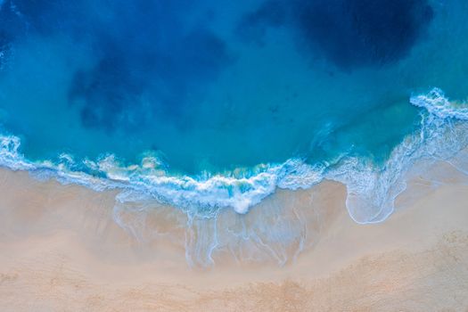 Aerial view of Kelingking Beach in Nusa Penida island, Bali in Indonesia.