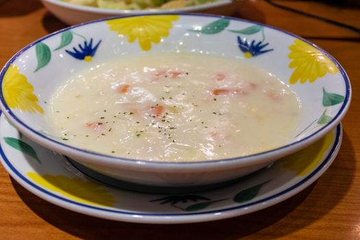 Creamy clam chowder soup in a bowl