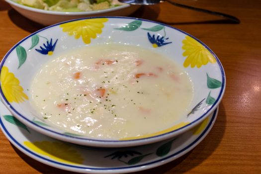 Creamy clam chowder soup in a bowl