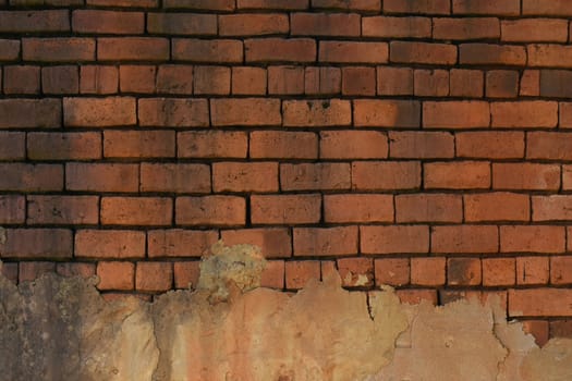 Old rough red clay brick wall surface close-up frame, Limpopo, South Africa