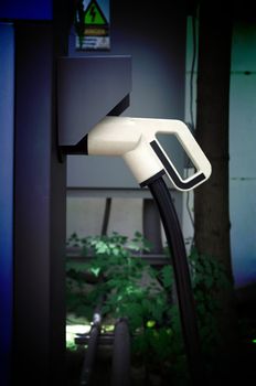 Electric vehicle charging (Ev) station with plug of power cable supply for Ev car