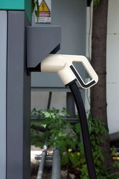 Electric vehicle charging (Ev) station with plug of power cable supply for Ev car