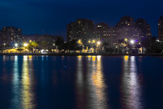 a wide long exposure cityscape shoot from izmir city - dark white dominated colors. photo has taken from izmir/turkey