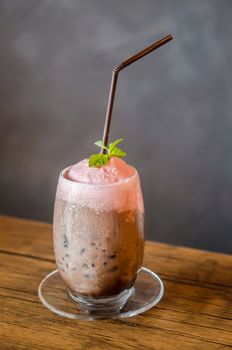 Chocolate and strawberry smoothie on table in resturant bar.