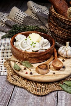 Traditional eastern food manty on an old wooden desk